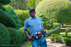 The late Pearl Fryar, topiary artist and gardener, in his garden