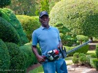 The late Pearl Fryar, topiary artist and gardener, in his garden