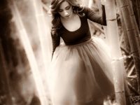 19 year old brunette woman in dance clothing on a path in a bamboo forest