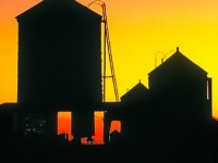 Silhouette of water tanks at sunset, New York City