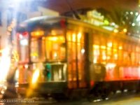 A brightly lit street car on Canal Street in New Orleans.