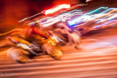 Motorcycles buzzing New York at night, photograph Joseph De Sciose